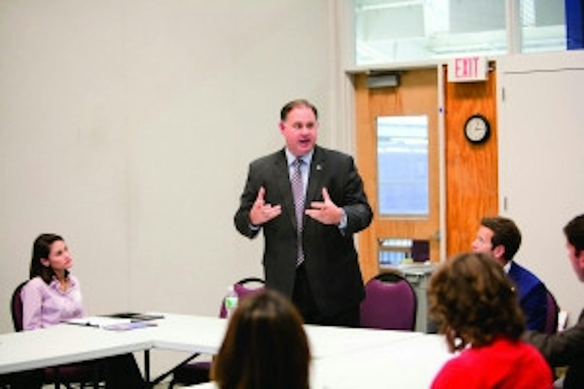 CAMERON JOHNSON/STAFF Frank Guinta speaks to students during his Tuesday visit. Along with him was U.S. Rep. Aaron Schock, 33, the second youngest member of the House.