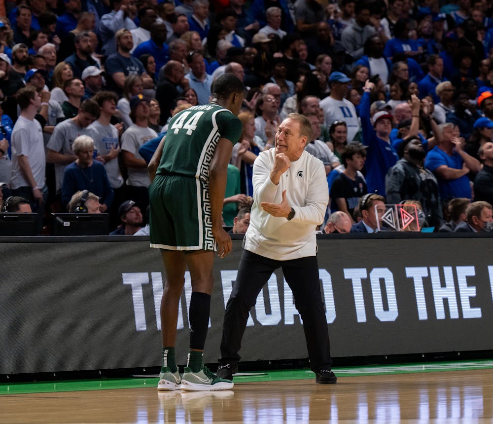 <p>Head Coach Tom Izzo speaks to senior forward Gabe Brown (44) on the sidelines during Duke&#x27;s victory over Michigan State on March 20, 2022.</p>