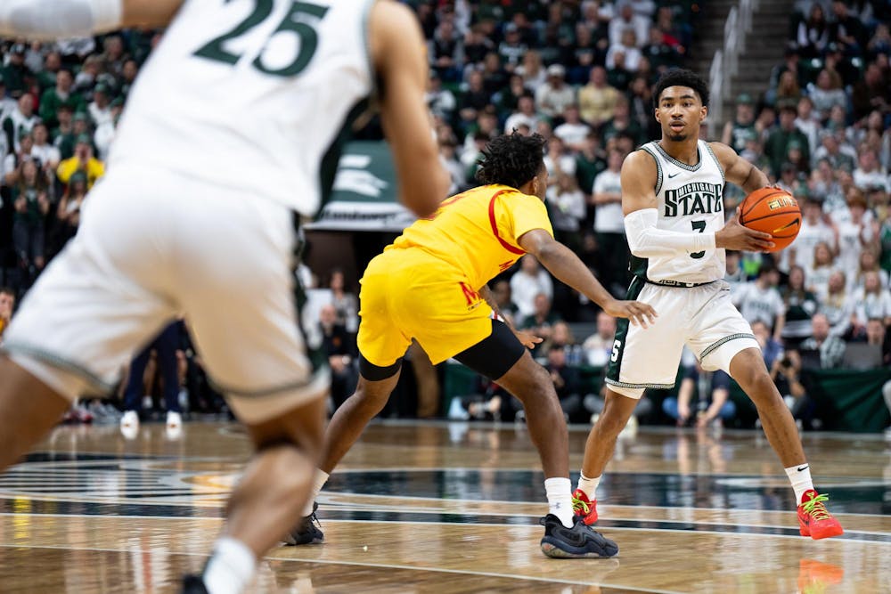 <p>Michigan State University junior guard No. 3 Jaden Akins looks to make a pass during a MSU vs Maryland men’s basketball game at the Breslin Center in East Lansing on Feb. 3, 2024. Both MSU and Maryland came into the game with a tied in-conference record and are looking to move up in the Big 10 standings.</p>