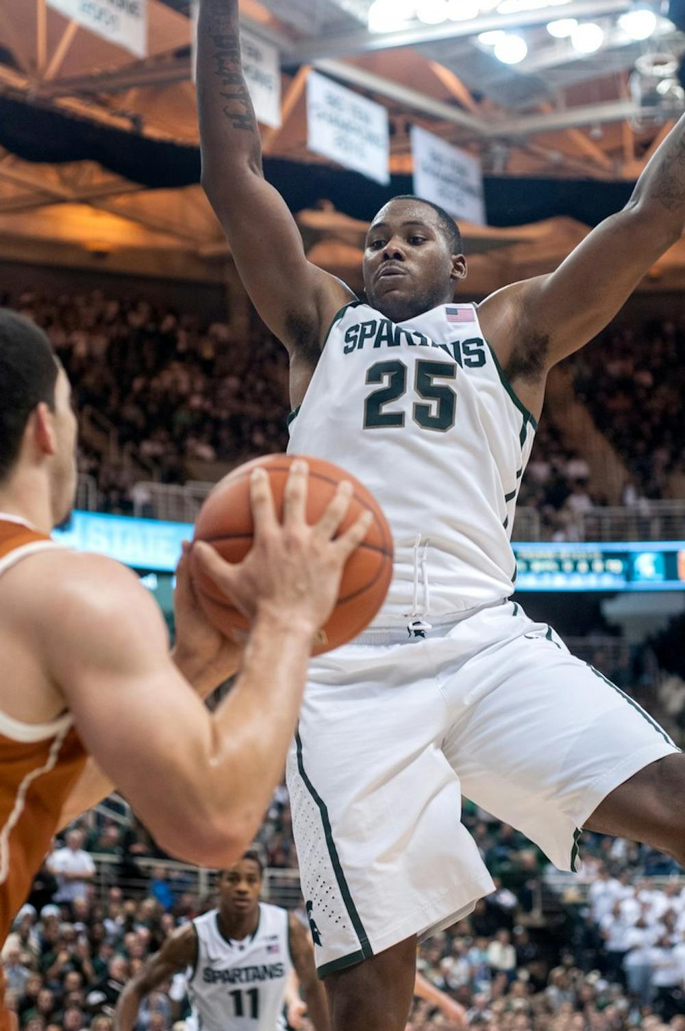 	<p>Senior center Derrick Nix attempts to block a Texas player on Dec. 22, 2012, at Breslin Center. Nix had a career high 25 points and 11 rebounds in the game, helping the Spartans beat the Longhorns 67-56. Natalie Kolb/The State News</p>