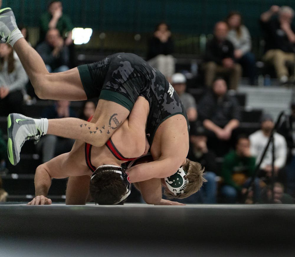 Redshirt sophomore Caleb Weiand battles a Rutgers opponent during the dual match at Jenison Field house on Feb. 13, 2026.