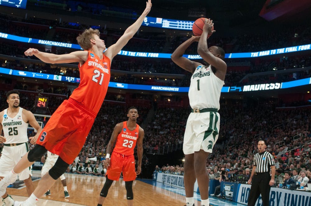<p>Sophomore guard Joshua Langford (1) shoots the ball during the game against Syracuse on March 18, 2018 at Little Caesars Arena in Detroit. &nbsp;The Spartans fell to the Orange, 55-53 ending their NCAA journey. &nbsp;</p>