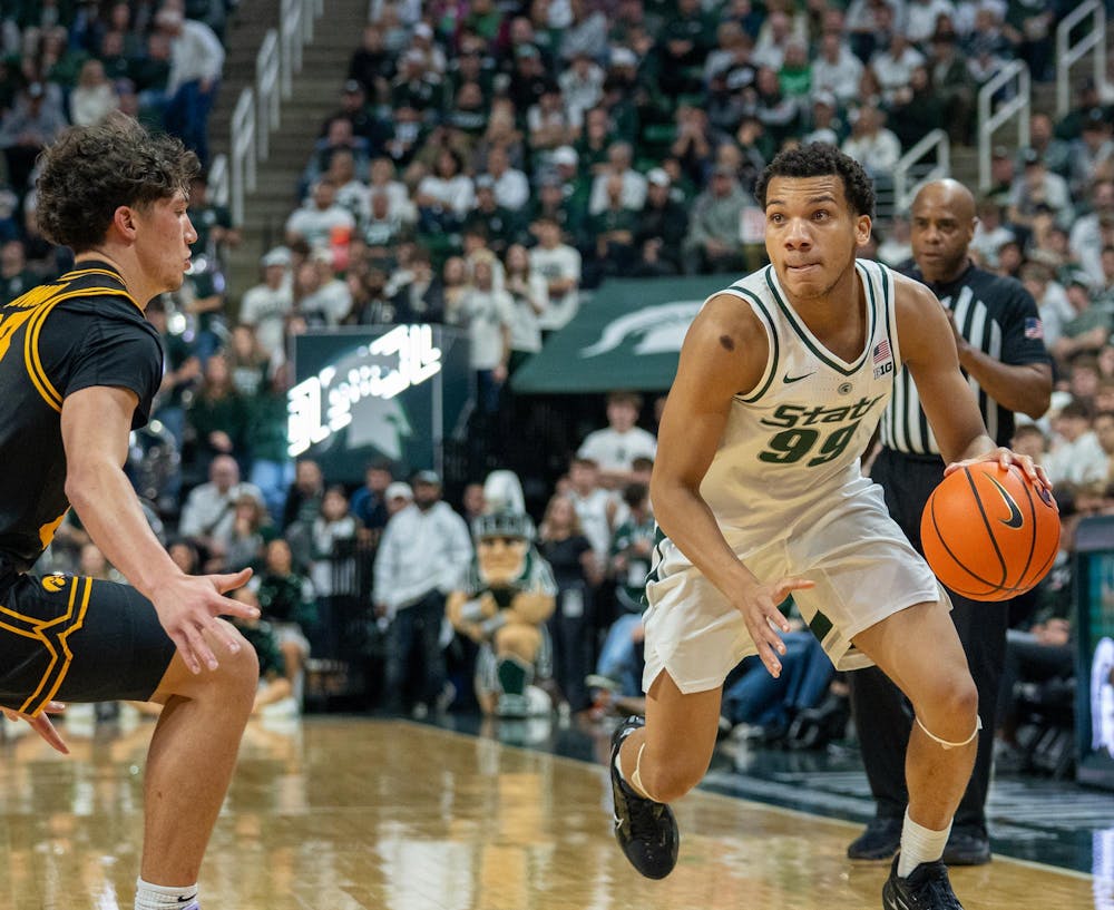 <p>Sophomore guard Divine Ugochukwu (99) brings the ball up the court during the matchup against the University of Iowa at the Breslin Center on Dec. 2, 2025.</p>