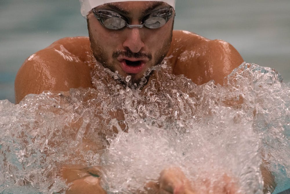 Sophomore Matthew Koueiter swims during the meet against Cleveland State Jan. 24, 2020 at McCaffree Pool.