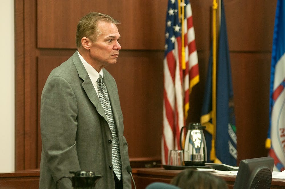 	<p>Randy McCowan, father of alleged killer Connor McCowan, stands during his testimony Oct. 8, 2013, at Ingham County Circuit Court in Lansing. Connor McCowan stands trial for open murder after the Feb. 23 killing of Andrew Singler.</p>