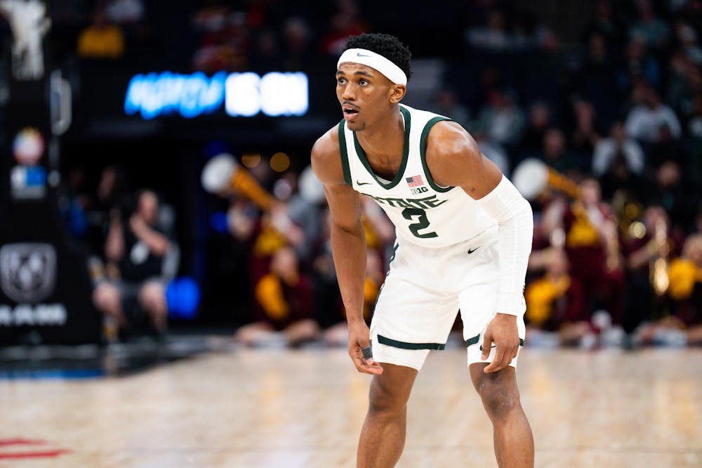 <p>Michigan State graduate guard No. 2 Tyson Walker watches for a rebound against the University of Minnesota during the Big Ten Tournament in Minneapolis, March 14, 2024. The Spartans knocked the Golden Gophers out of the tournament, securing a spot in the quarterfinals against No. 1 seed Purdue.</p>