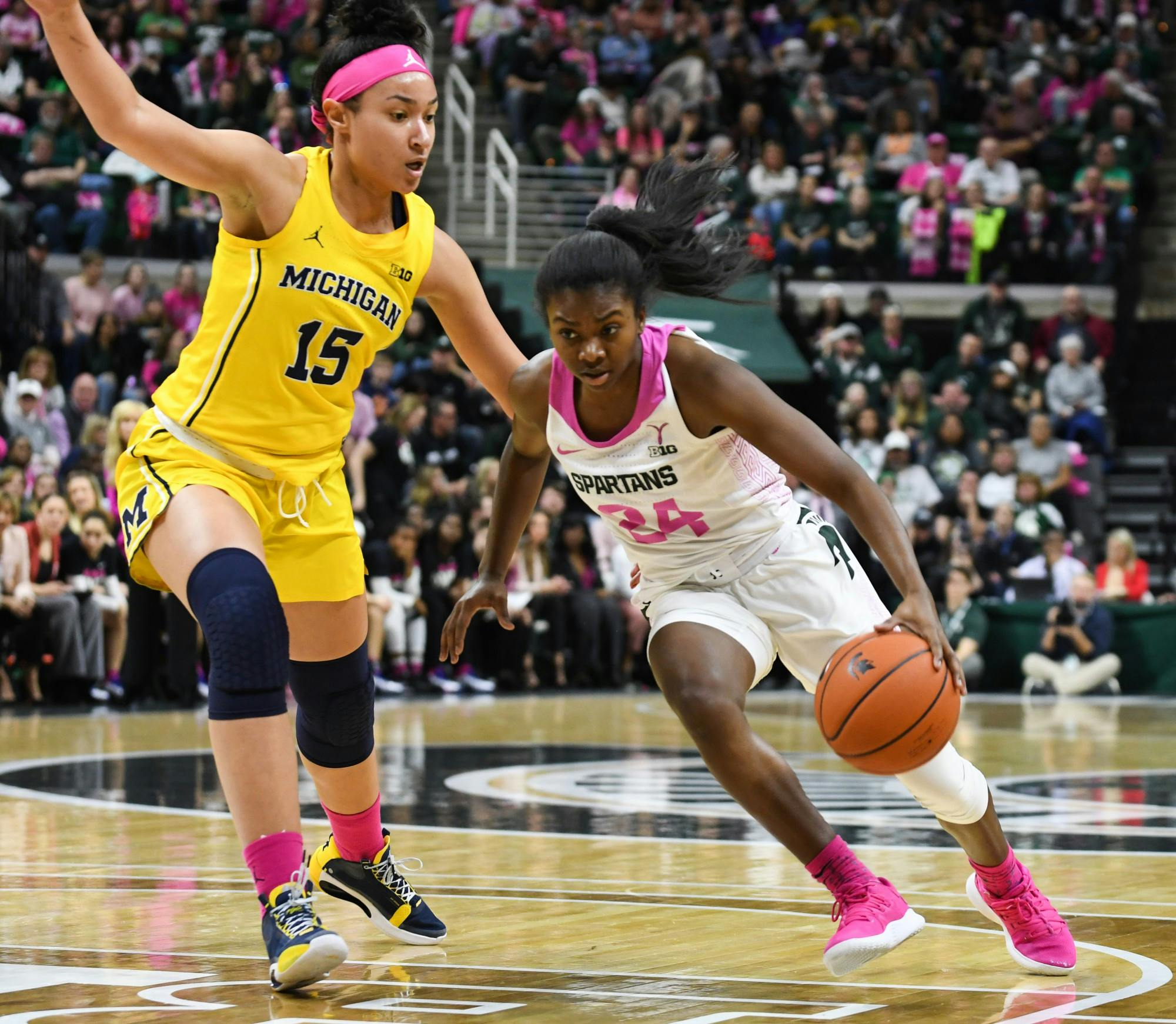 <p>Then-sophomore guard Nia Clouden (24) pushes past a defender during the game against Michigan at the Breslin Center on Feb. 23, 2020. The Spartans fell to the Wolverines, 65-57. </p>