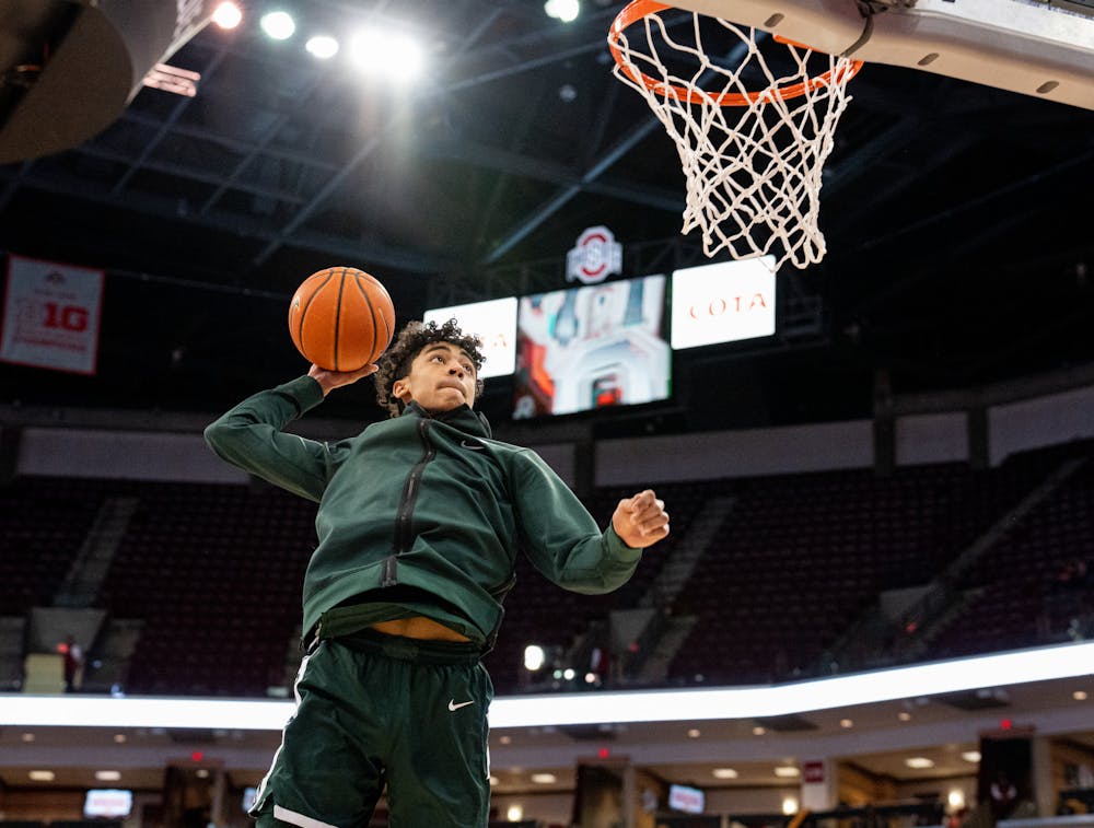 <p>Freshman guard Max Christie throws down a dunk during warm-ups before the Spartans&#x27; game against the Buckeyes on March 3, 2022 at Ohio State&#x27;s senior night.</p>