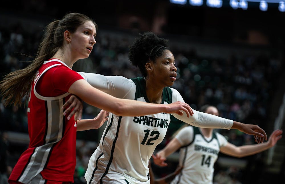 <p>Isaline Alexander (12), senior forward for Michigan State University, faces off with Elsa Lemmilä (12), sophomore center for Ohio State University, during a women’s basketball game at the Breslin Center in East Lansing on Sunday, March 1, 2026.</p>