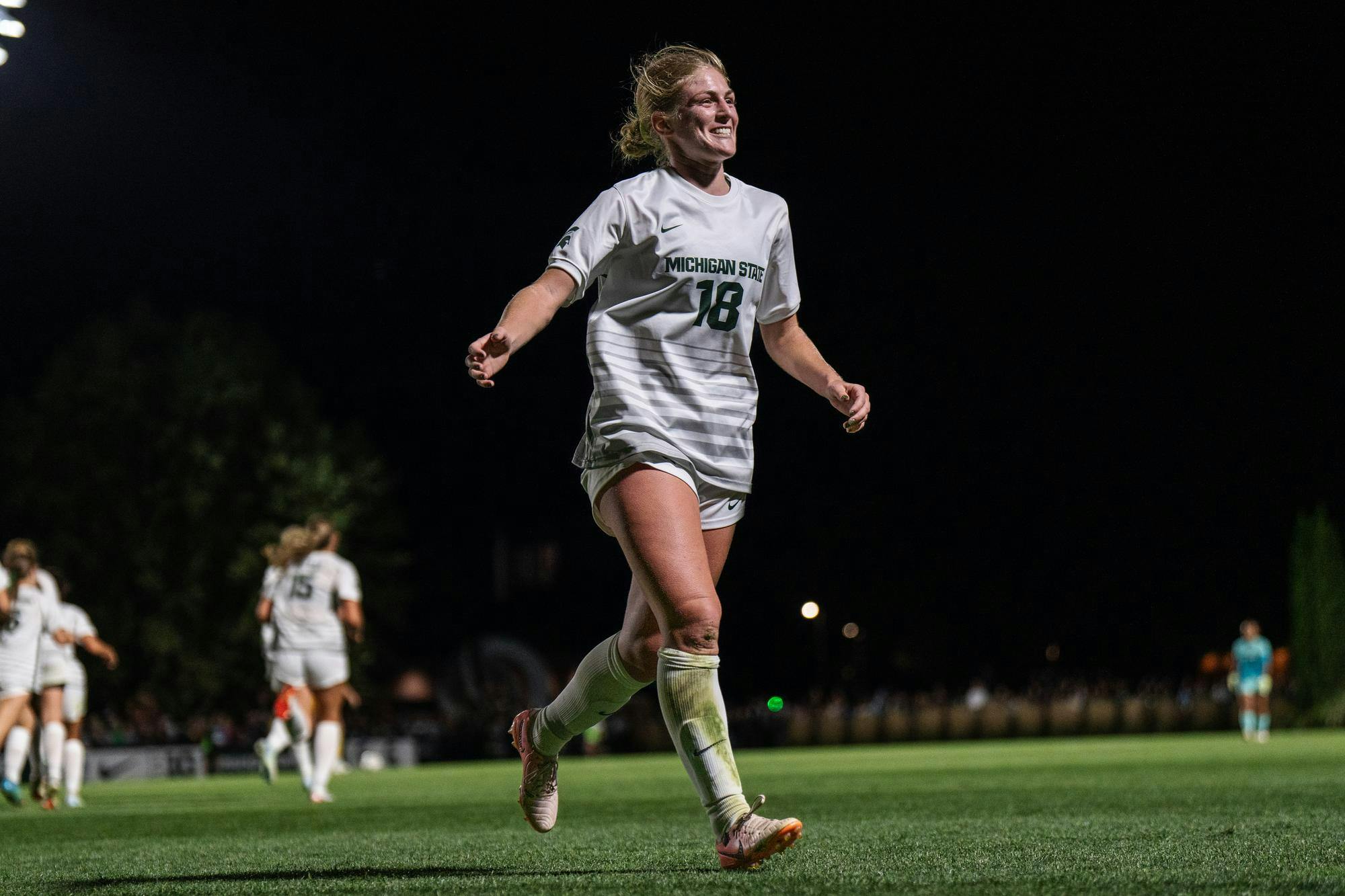 <p>Spartan graduate student midfielder Justina Gaynor (18) runs toward the Red Cedar Rowdies to celebrate making the game-winning goal against the University of Michigan at DeMartin Stadium on Oct. 5, 2024.</p>