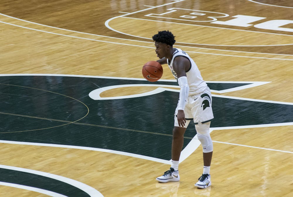 <p>Sophomore guard Rocket Watts (2) waits for an opening to pass to one of his teammates in the second half of the game. Michigan State triumphed over Notre Dame, 80-70, Nov. 28, 2020. </p>
