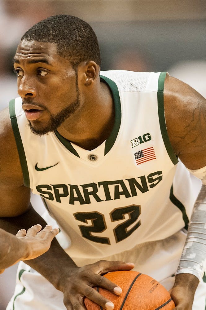 	<p>Junior forward Branden Dawson looks for an open teammate during the game against McNeese State on Nov. 8, 2013, at Breslin Center. The Spartans defeated the Cowboys, 98-56. Khoa Nguyen/The State News</p>