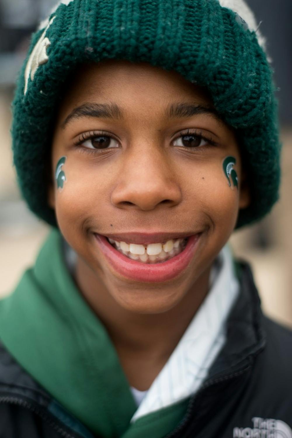 Farmington Hills, Mich., resident Mill Coleman III, 10, poses for a portrait before the Goodyear Cotton Bowl Classic on Dec. 31, 2015 at AT&T Stadium in Arlington, Texas. Coleman is the son of Mill Coleman, who played for Michigan State in the 90s.