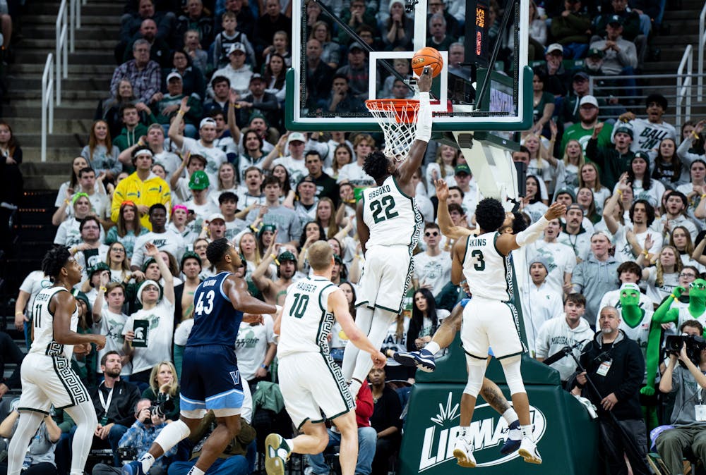 <p>Junior center Mady Sissoko (22) dunks the ball during a game against Villanova at the Breslin Center on Nov. 18, 2022. The Spartans defeated the Wildcats 73-71. </p>