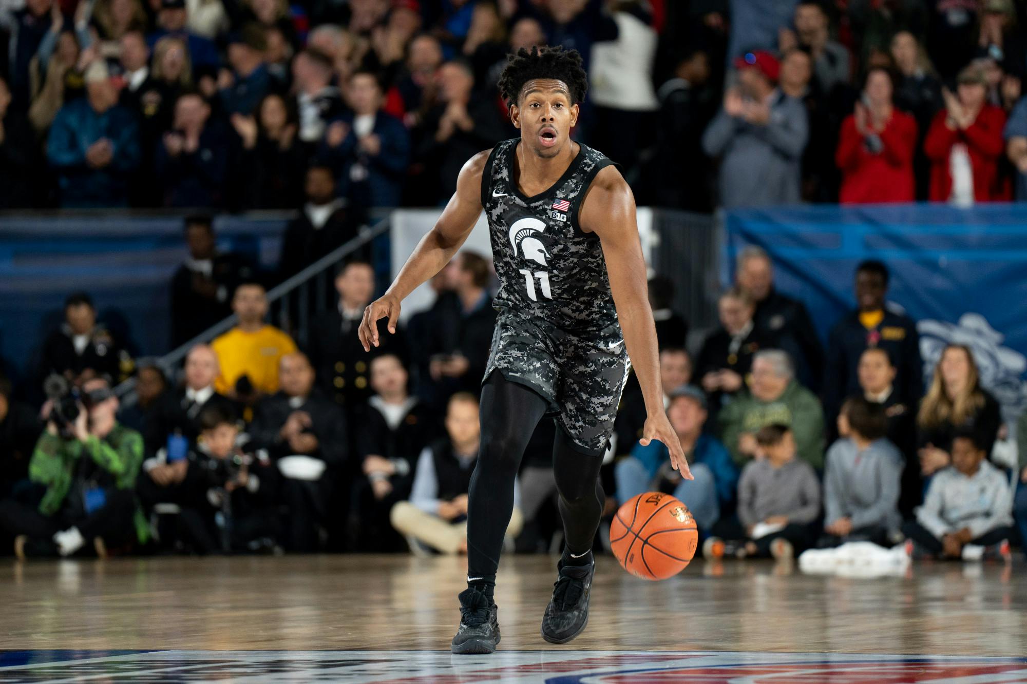 Junior guard AJ Hoggard dribbles down the court during the Spartans matchup with No. 2 Gonzaga in the 2022 Armed Forces Classic on Nov. 11. The Spartans fell 64-63.