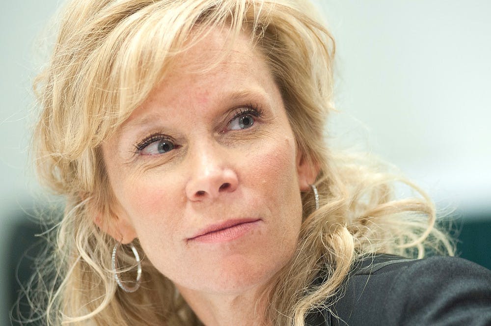 	<p>Head coach Suzy Merchant talks to the media on Oct. 8, 2012, at Breslin Center during media day. Merchant was voted coach of the winter by The State News sports reporters. Justin Wan/The State News</p>