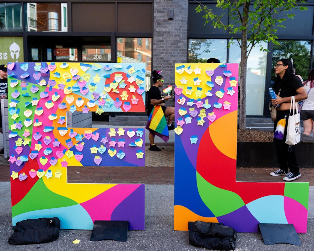 <p>The letters "EL" are put up as a board for people to place the names of people they are thankful for during East Lansing Pride in East Lansing, Mich., on June 13, 2026.</p>