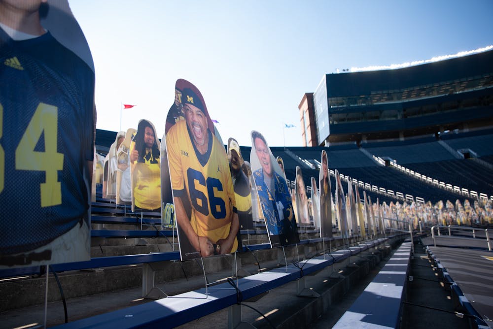 <p>Cardboard fans watch MSU play U of M in The Big House on Oct. 31, 2020.</p>