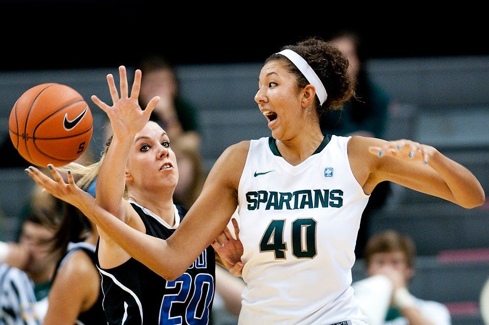 Redshirt freshman center Madison Williams loses control of the ball. Williams had seven points and 11 rebounds. Spartans defeated the Lakers, 75-23, on Nov. 4, 2011 at Breslin Center. 