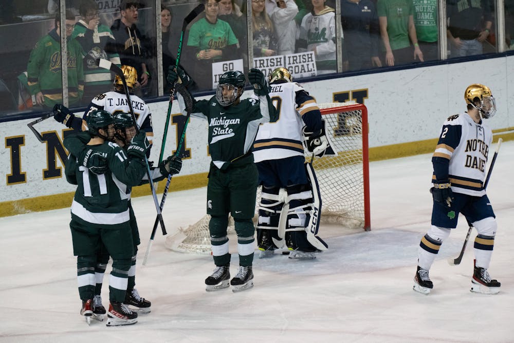 <p>The Spartans celebrate after scoring on Notre Dame goalie Ryan Bischel at Compton Family Ice Arena in Notre Dame, IN on Friday, March 4, 2023. Bischel posted a shutout against MSU the night before, but a flurry of offense from Michigan State resulted in a 4-2 victory on Saturday.</p>