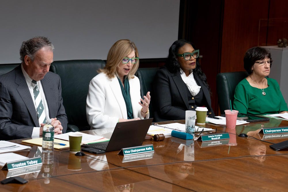 MSU Interm President Teresa Woodruff, center left, speaks during a MSU Board of Trustee's meeting in East Lansing, Mich., Feb. 2, 2024. The Board of Trustees fielded comments from the public, including the divestment of the university's assets from Israel.