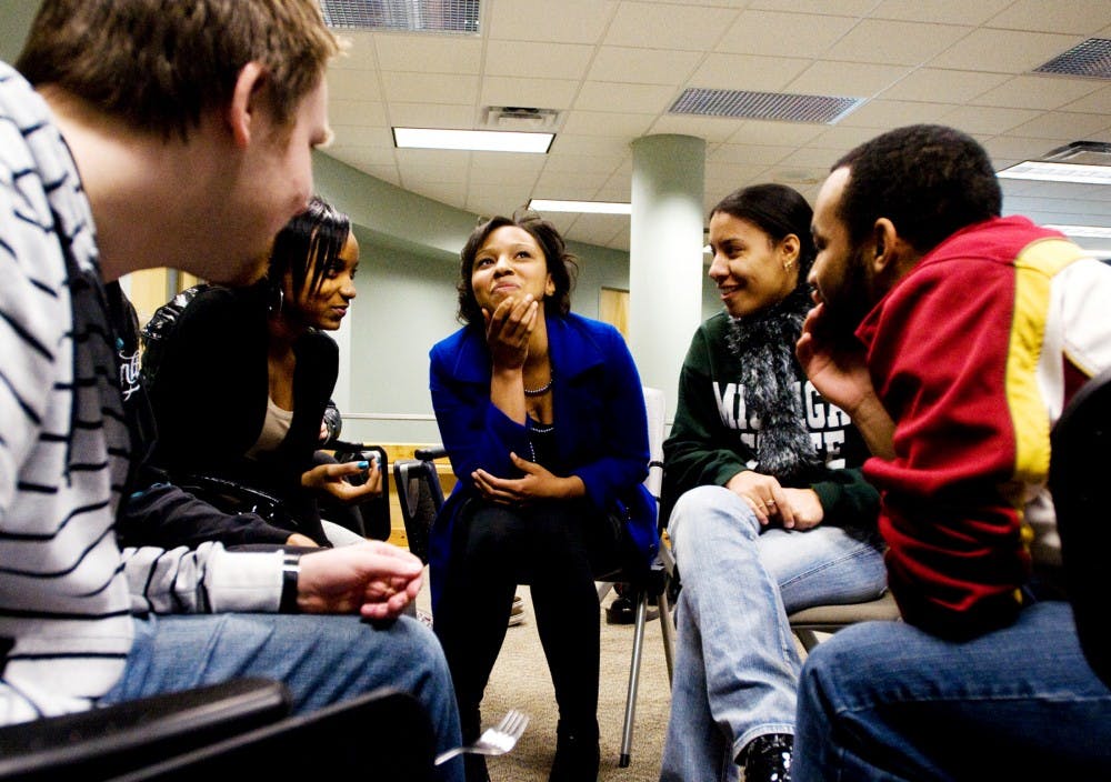 Office of Cultural and Academic Transitions, or OCAT, mentors from Case, Wonders, and Wilson Halls brainstorm ideas for programs that raise awareness regarding why events throughout the world are important to the students they work with. OCAT mentors' main goal is to assist students, particularly freshman, with the transition into campus life. Matt Hallowell/The State News