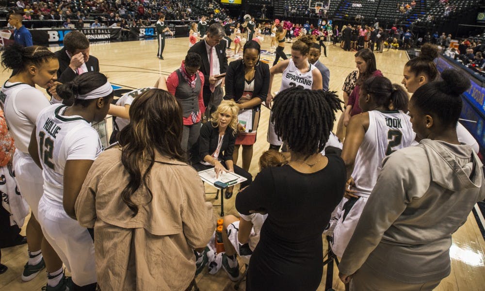 Head coach Suzy Merchant talks to the team during the game against the Maryland in the semi-final round of the women's Big Ten Tournament on March 4, 2017 at Bankers Life Fieldhouse in Indianapolis. The Spartans were defeated by the Terrapins, 100-89.