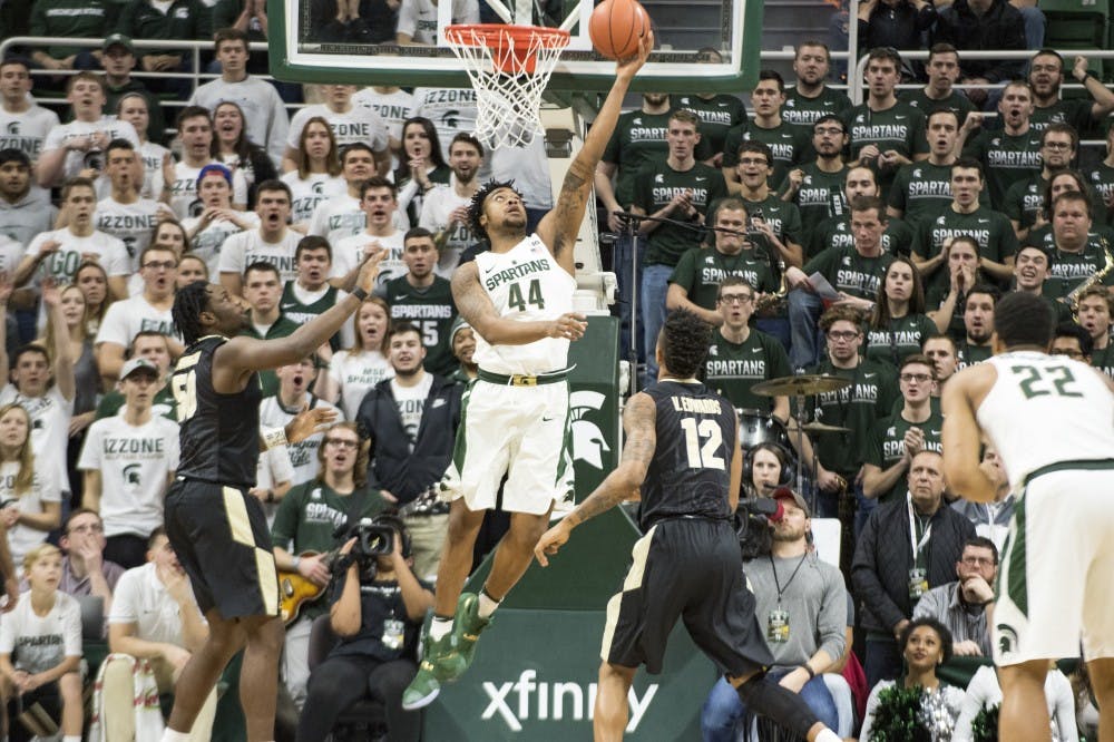 Freshman forward Nick Ward (44) goes for a lay up during the first half of the men's basketball game against Purdue on Jan. 24, 2017 at Breslin Center. The Spartans are tied with the  Boilermakers, 39-39 at the half.