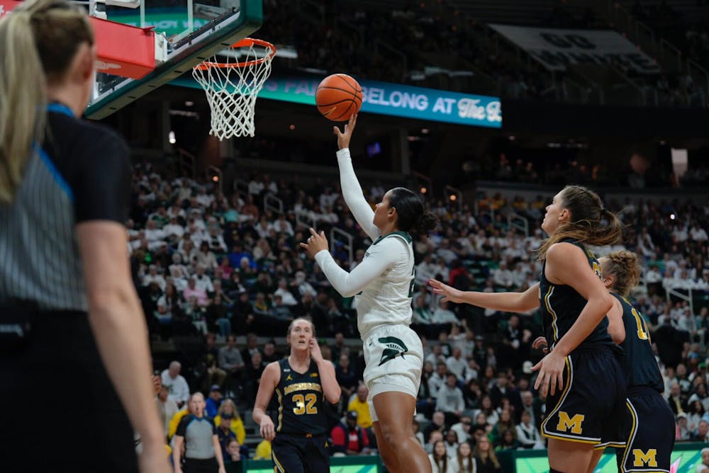 Guard Moira Joiner puts up two points against U of M at the Breslin Center on Sunday, Feb. 5, 2023. The Spartans finished the first half with 40 points to Michigan’s 33.