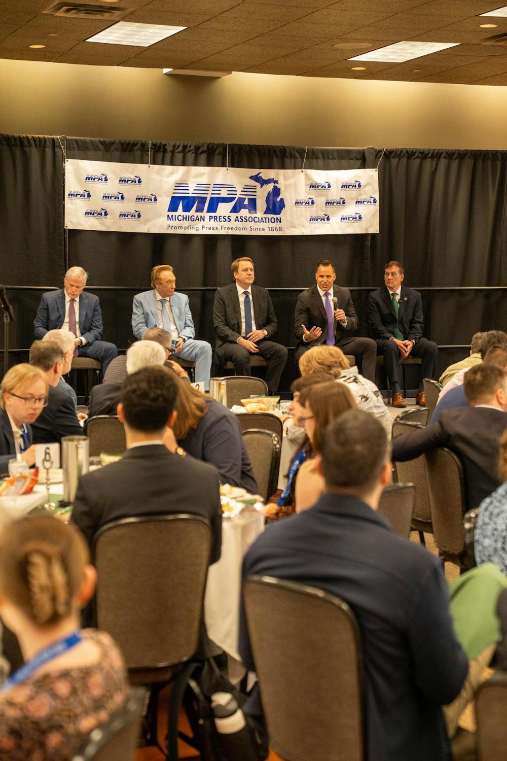 Candidates speaking during the MPA Gubernatorial Candidate Luncheon at the Kellogg Center in East Lansing, on April 23, 2026.