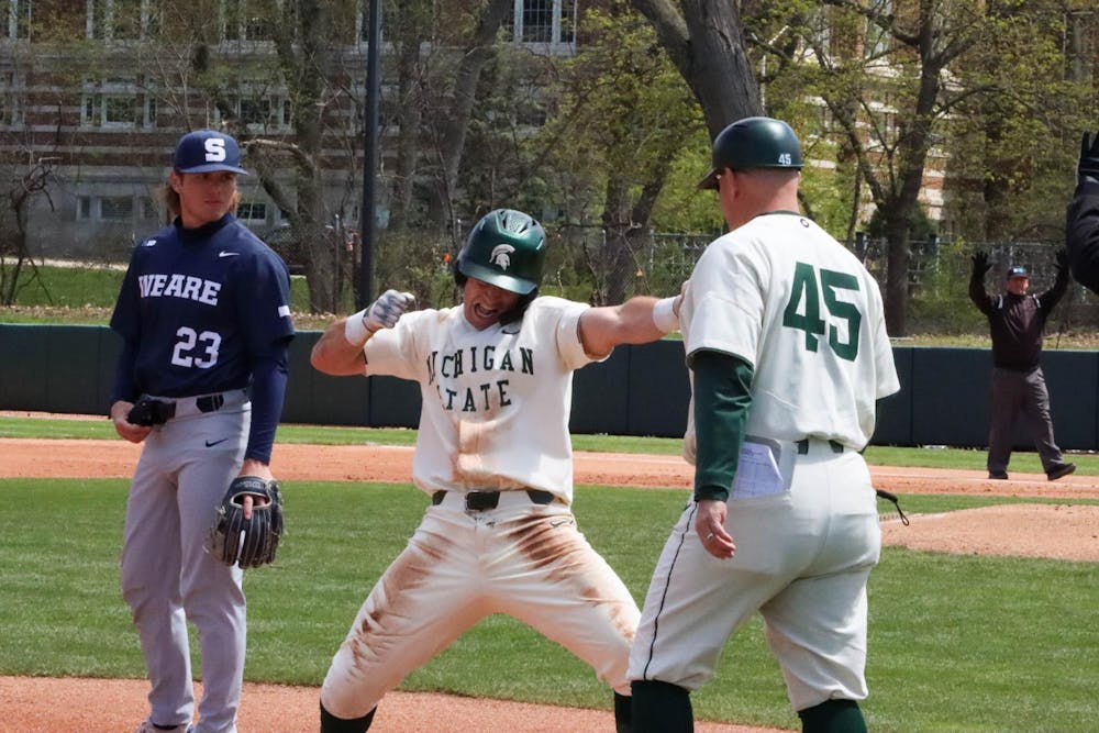 <p>Junior outfielder Nick Williams celebrates a successful run to third base in the matchup against Penn State at McLane Baseball Stadium on April 21, 2024.</p>