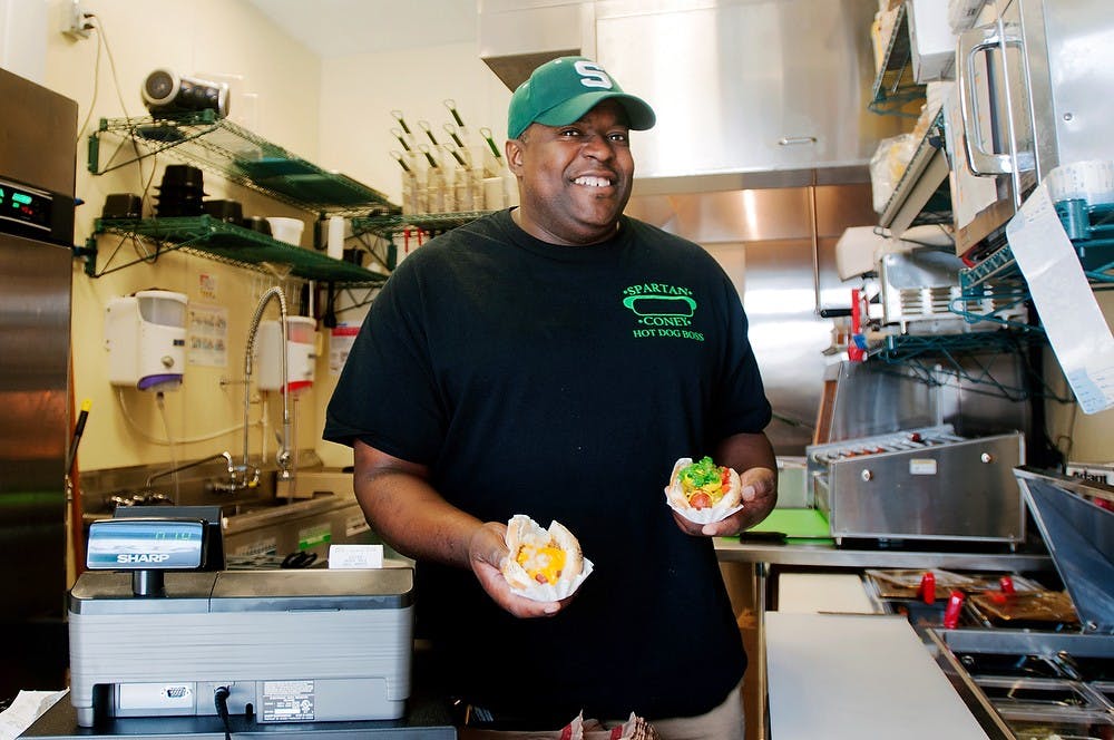 	<p>Derrick Austin, owner of Spartan Coney poses for a portrait on Sept. 17, 2013 at Spartan Coney, 551 East Grand River Ave. Austin is also the general manager at Southwest Grill. Georgina De Moya/The State News</p>