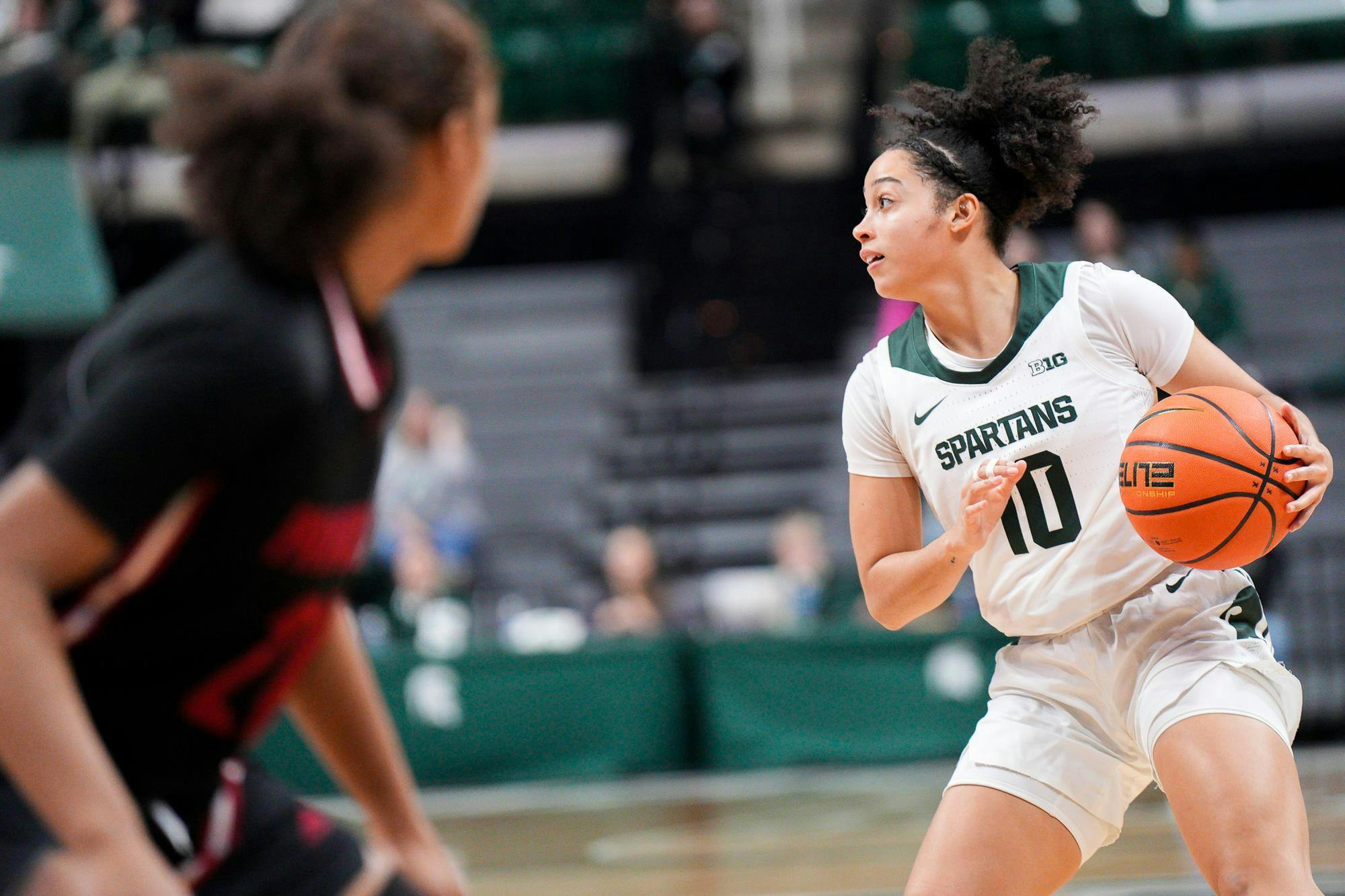 <p>Freshman guard Bree Robinson (10) looks to teammates to make a play during the season opening exhibition game against Davenport University at the Breslin Center on Nov. 2, 2023. The Spartans annihilated the Panthers with a score of 99-45.&nbsp;&nbsp;</p>