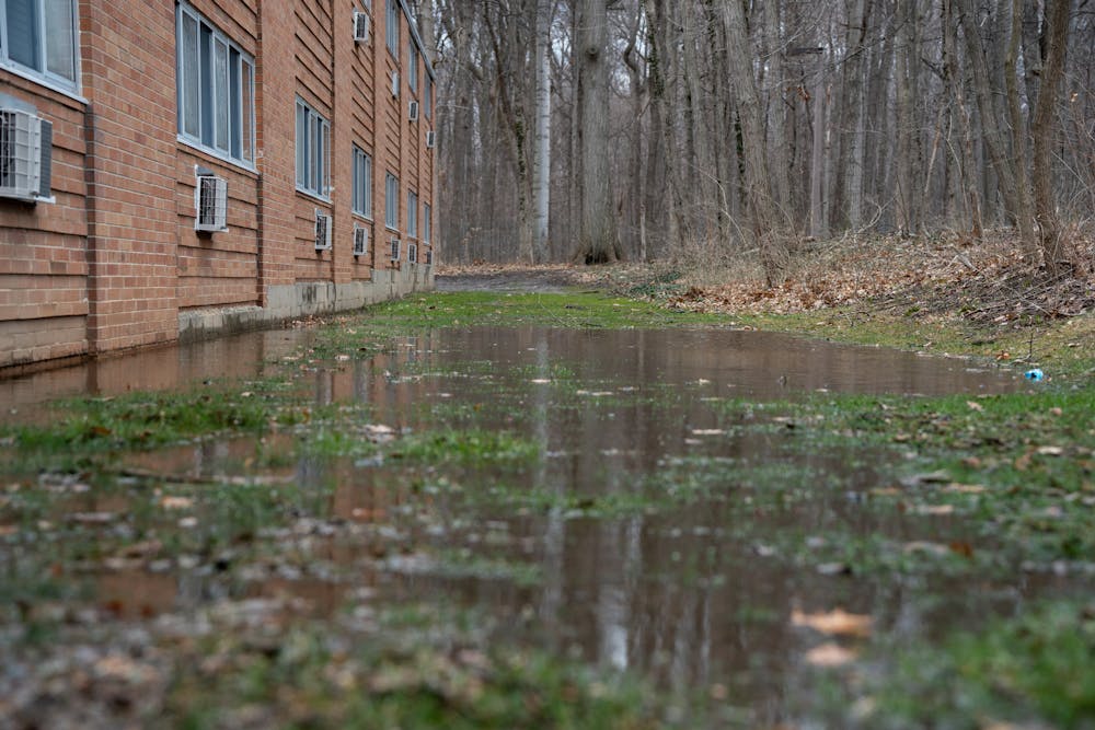<p>A huge puddle is formed near Van Hoosen Hall after heavy rainfall on campus on April 5, 2023.</p>