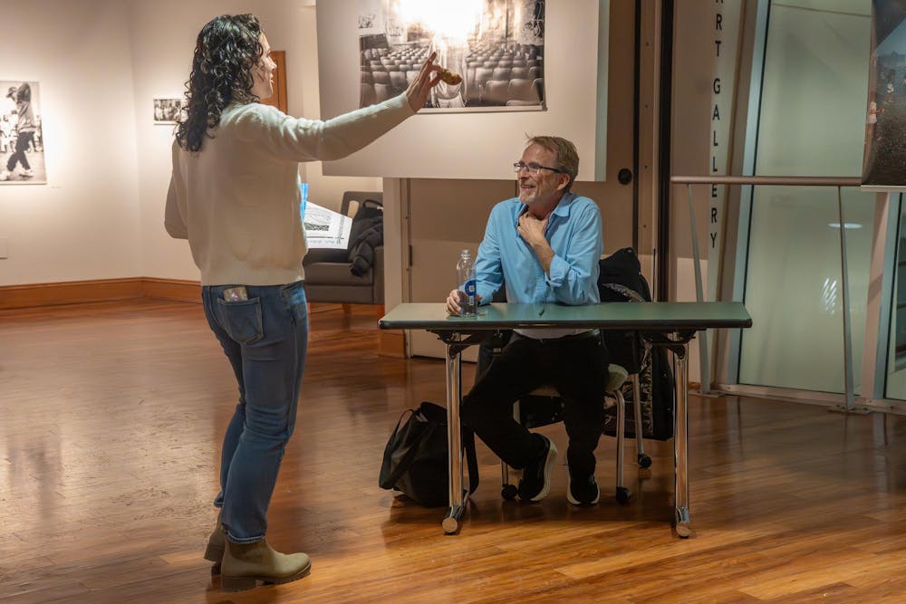 Vanessa Hanson speaks with Dennis Hinrichsen during the book signing portion of the Residential College in the Arts and Humanities’ event after recently moving from San Francisco and attending to explore her new community in East Lansing, Mich., on Feb. 25, 2026.