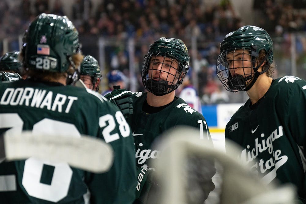 <p>Michigan State players chat at the bench during a timeout against the under-18 U.S. Men's National Team Development Program at USA Hockey Arena in Plymouth, Michigan on Nov. 21, 2024. In front of a sold out crowd, the Spartans captured a convincing 6-2 victory, showcasing why they deserve their ranking of number two in the nation.</p>