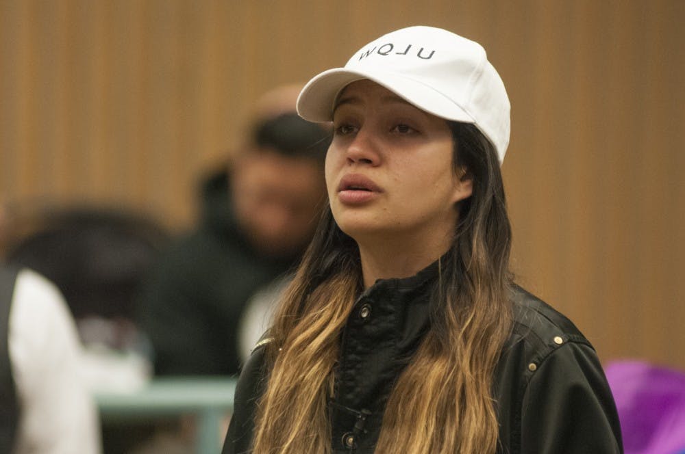 Agribusiness management junior Alondra Alvizo tells an emotional story during the Latinx Students In Need of Solidarity Town-Hall on Oct. 13, 2016 in the Erickson Hall Kiva. The town-hall, hosted by Culturas de las Razas Unidas, included stories from students who had experienced racism.