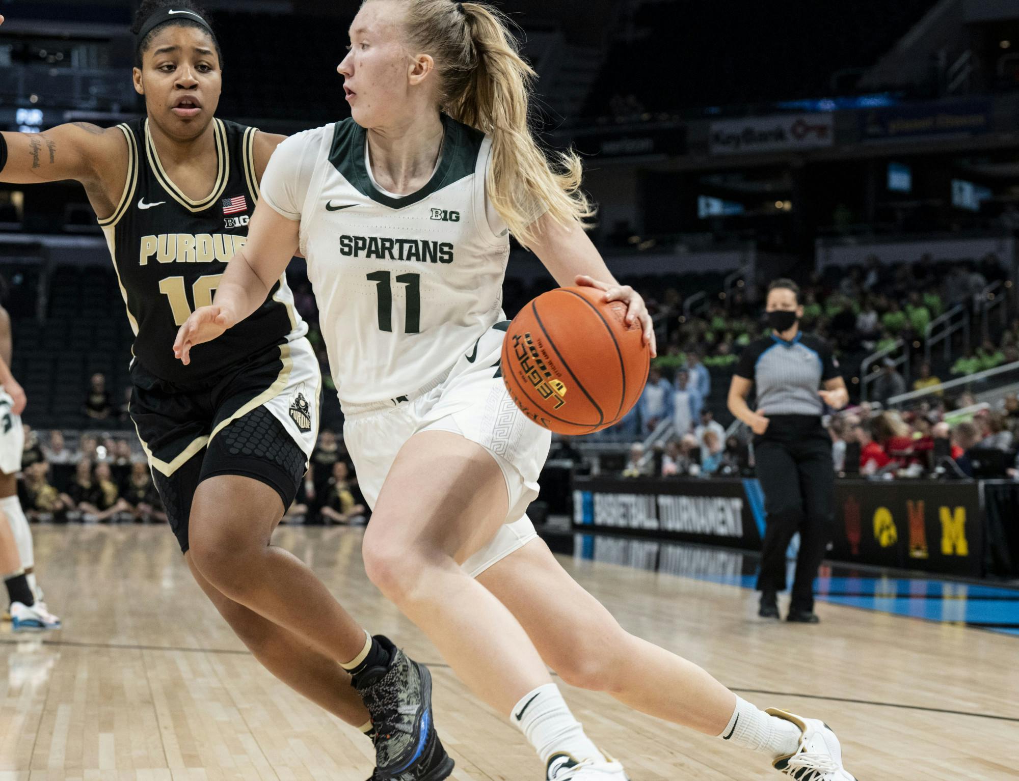 <p>Ekh (11) squeezes past Purdue&#x27;s junior guard Jeanae Terry (10) in the Spartans&#x27; first B1G matchup against the Boilermakers at Gainbridge Fieldhouse in Indianapolis. March 3, 2022.</p>