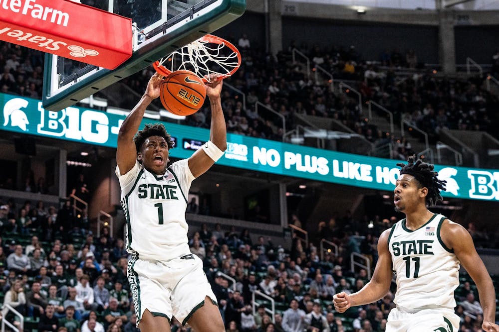 <p>Michigan State University senior guard A.J. Hoggard (11) watches his teammate freshman guard Jeremy Fears Jr. (1) scoring against Alcorn State University at the Breslin Center on Nov. 19, 2023.</p>