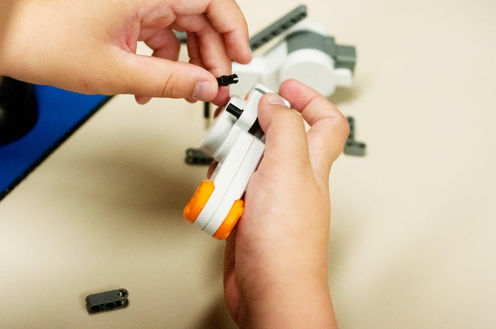 Students were given an opportunity to learn about robotics at Spartaneering, a Lego robotics class, on Monday morning in the Engineering Building. Samantha Radecki/The State News