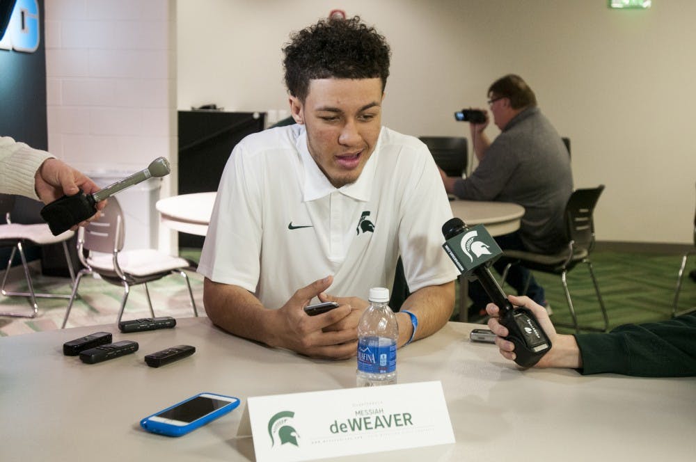 Freshman quarterback Messiah deWeaver speaks to members of the media during a round table press conference on Jan. 15, 2016 at Spartan Stadium. After Coach Mark Dantonio addressed the press, seven of the eight early enrollees discussed their excitement for joining the program and their adjustment to college life. 
