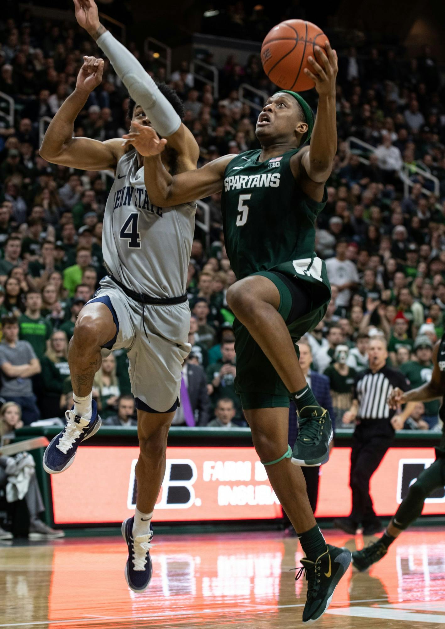 <p>Former MSU player Cassius Winston (5) goes for a lay-up in the final moments of a basketball game against Penn State at the Breslin Center on Feb. 4, 2020. The Spartans fell to the Nittany Lions, 70-75.</p>