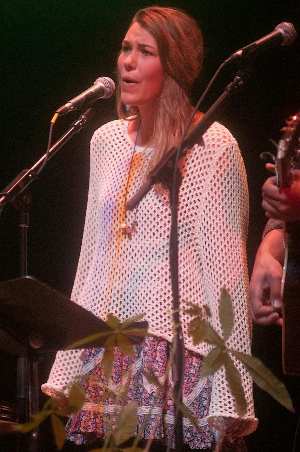 <p>Co-founder of "Songs Against Slavery," Grace Theisen sings on April 16, 2014, at Wharton Center for Performing Arts. The event supported the nonprofit "Project Liberty" which works to stop human trafficking in the U.S. Betsy Agosta/The State News</p>