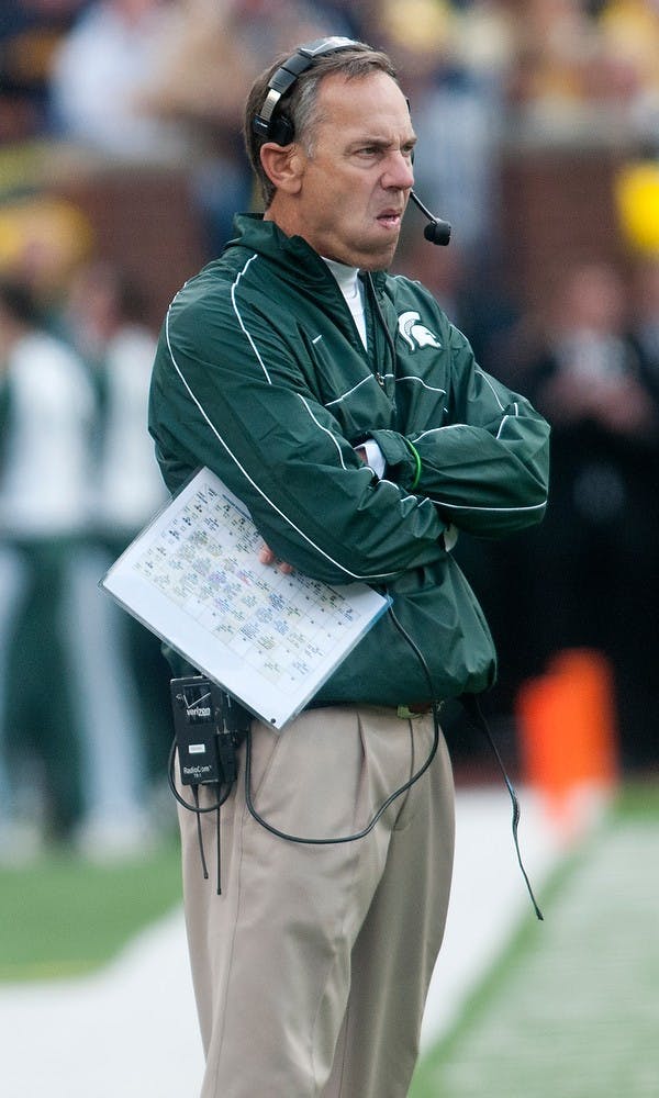 Head coach Mark Dantonio watches the game against Michigan on Saturday, Oct. 20, 2012 in Michigan Stadium. The Spartans lost 12-10, after the Wolverines kicked a field goal with five seconds left. Julia Nagy/The State News