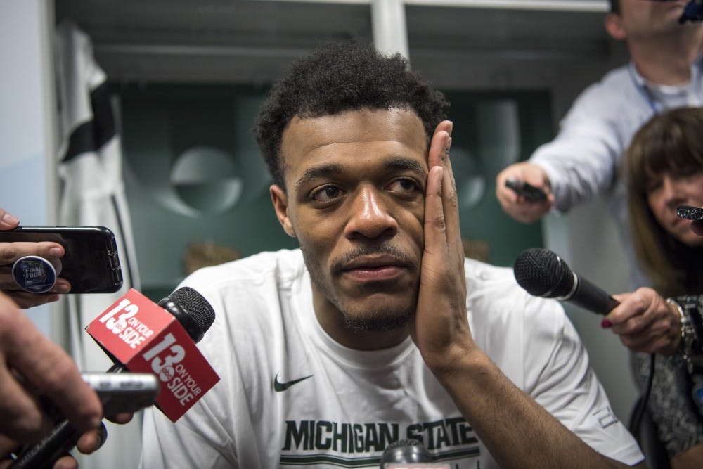 Sophomore forward Xavier Tillman (23) responds to questions during post-game interviews of the NCAA Final Four game against Texas Tech at U.S. Bank Stadium in Minneapolis on April 6, 2019. The Spartans lost to the Red Raiders 61-51.  (Nic Antaya/The State News)