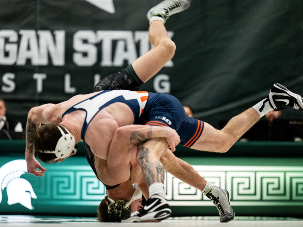 <p>Illinois’ Lucas Byrd (133) controls Michigan State’s Caleb Weiand (125) from the top position during their bout as the Spartans fall to the Fighting Illini at the Jenison Field House on Friday, Jan. 16, 2026</p>