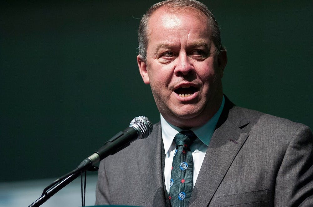 Athletic director Mark Hollis addresses the crowd April 3, 2015, during a final four Spartan pep rally at the Indiana Convention Center, 100 S. Capitol Ave., in Indianapolis, Indiana. Erin Hampton/The State News