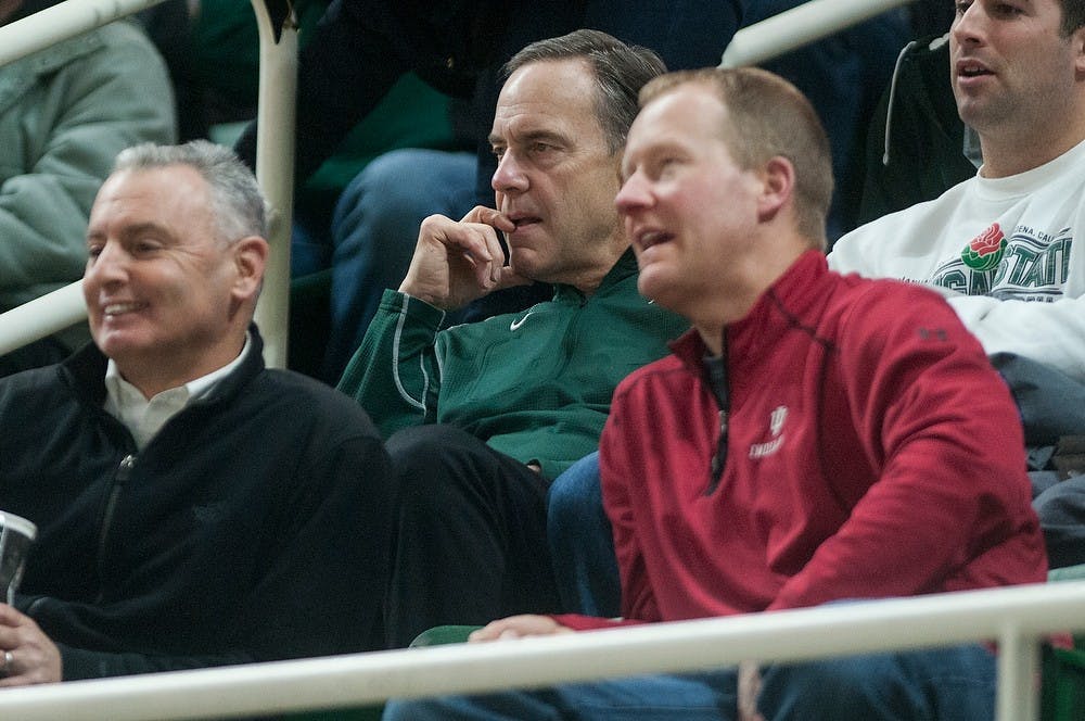 <p>MSU football head coach Mark Dantonio sits down to watch the Spartans play Jan. 5, 2015, during the game against Indiana at Breslin Center. The Spartans defeated the Hoosiers, 70-50. Erin Hampton/The State News</p>