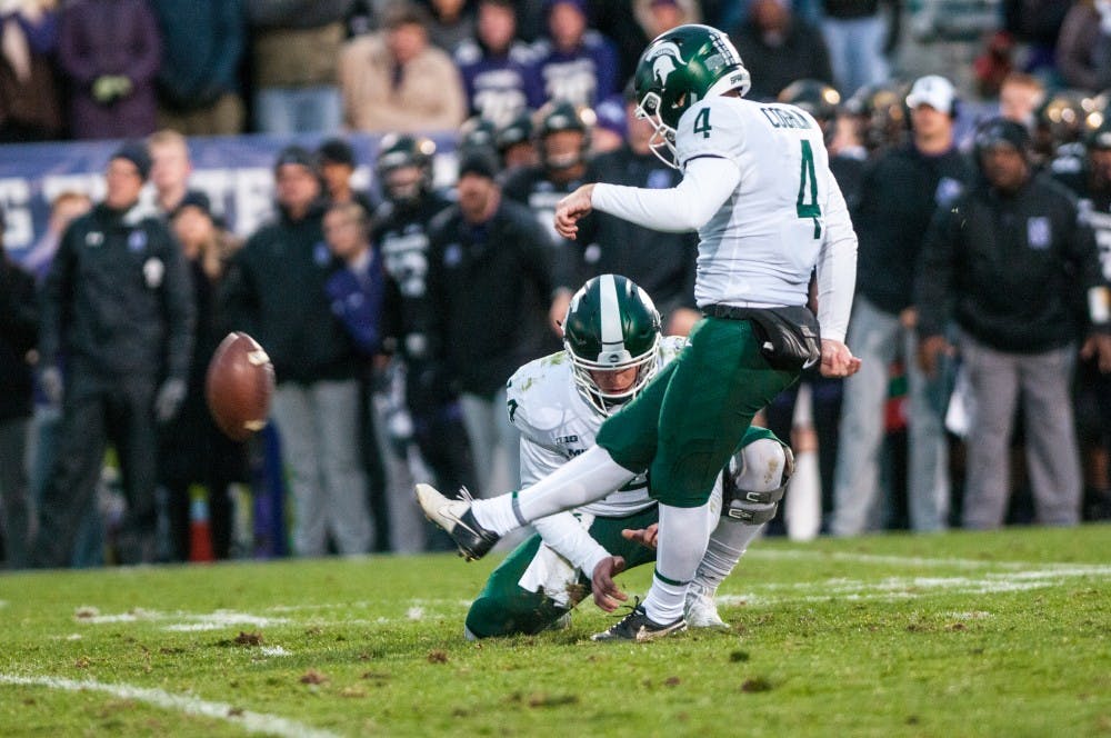 Redshirt freshman kicker Matt Coghlin (4) kicks a PAT during the game against Northwestern on Oct. 28, 2017, at Ryan Field. The Spartans fell to the Wildcats, 39-31, in 3OT.