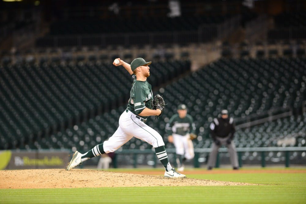 Junior pitcher Joe Mockbee pitches the ball during the game against Central Michigan on April 14, 2016 at Comerica Park in Detroit. The Spartans defeated the Chippewas, 7-3. 